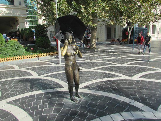 Sculpture Girl with Umbrella
